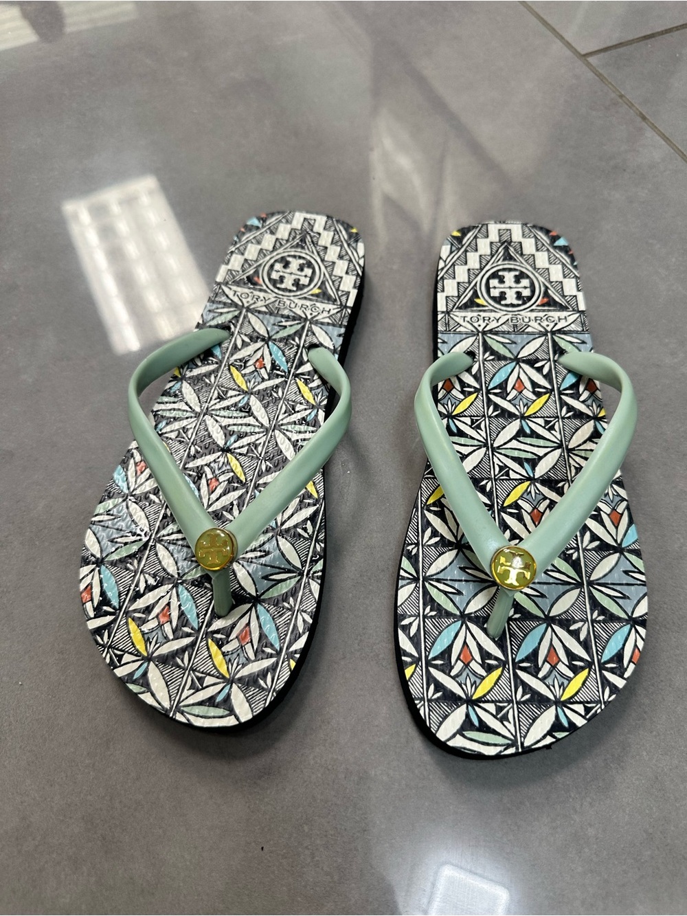 Tory Burch Mint Green Logo Flip Flops with Multicolor Geometric Print